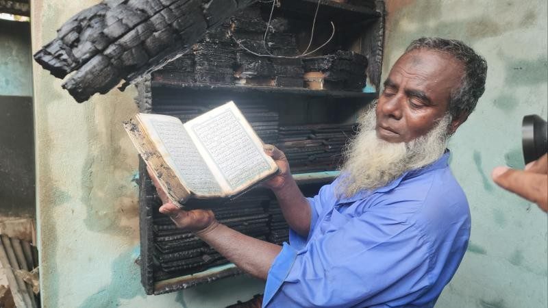 সবকিছু পুড়ে ছাই হলেও অক্ষত আল কোরআন